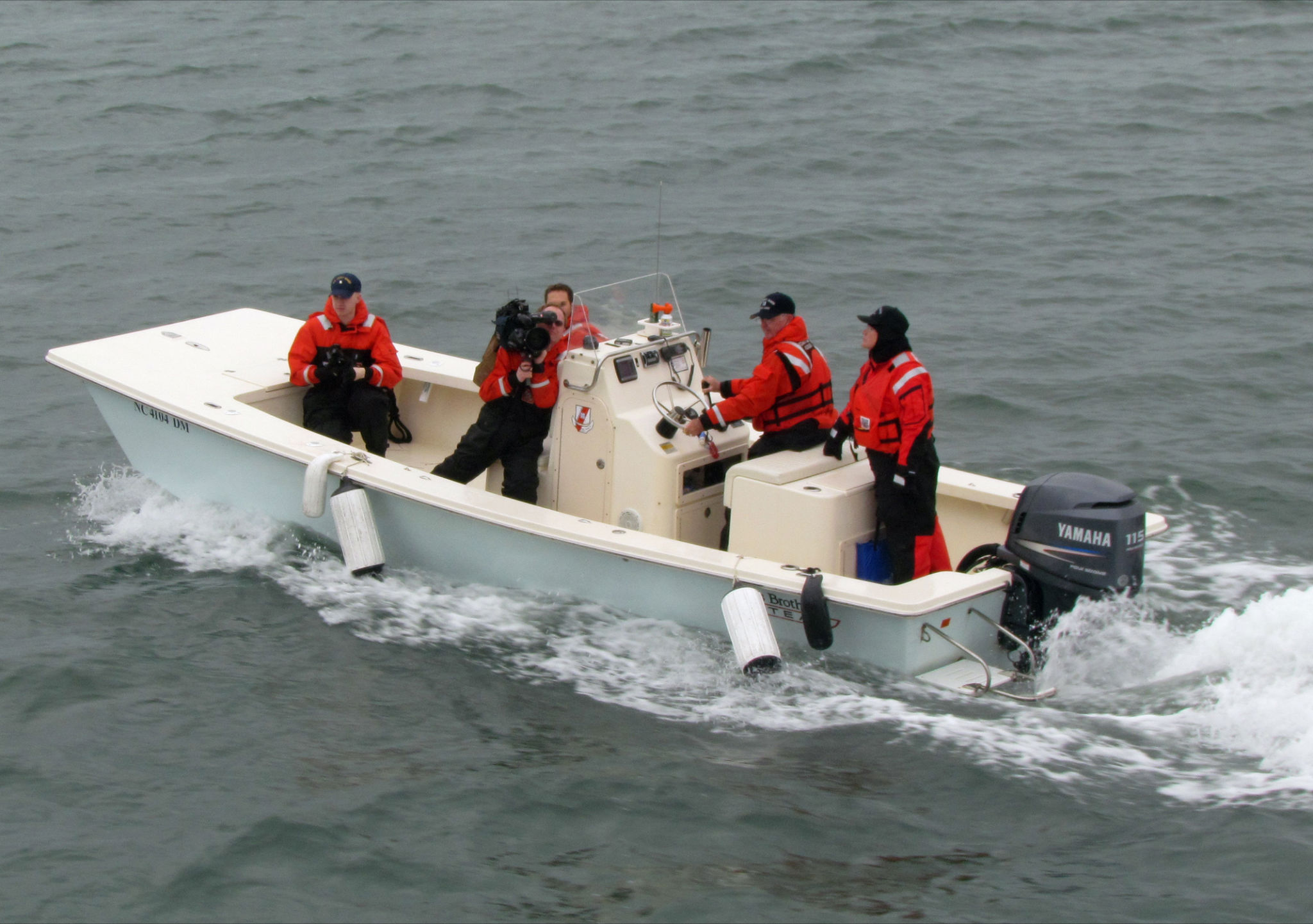 Boat with news crew aboard